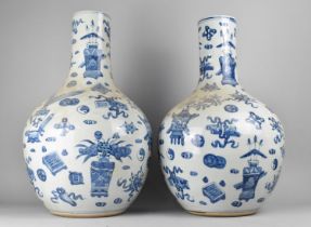 A Pair of Reproduction Chinese Blue and White Tall Bottle Vases, 61cms High