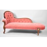 A Reproduction Mahogany Framed Button Upholstered Chaise Longue