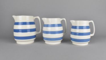 A Set of Three Graduated "Cornishware" Jugs by PPC, Tallest 13.5cm high