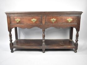 A Late 19th Century Oak Two Drawer Dresser Base with Brass Drop Handles and Pot Board Stretcher,