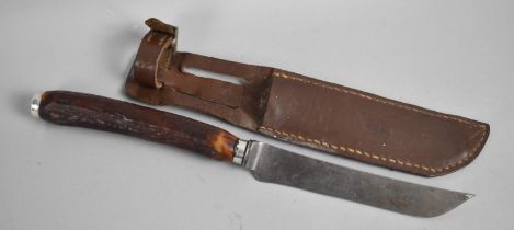 A Bone Handled Hunting Knife with Silver End Cap and Collar together with unrelated Leather Scabbard