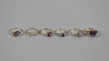 Six 9ct Gold Mounted Ladies Rings to include Topaz, Sapphire, Garnet, Diamond and Amethyst Mounted