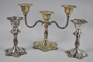 A Set of Silver Plated Candlesticks Comprising Three Branch Candelabra and Pair, Traces of