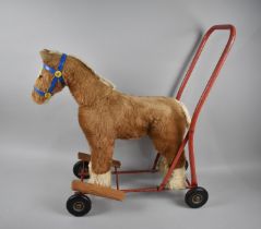 A Mid 20th Century Childs Ride-on Horse Toy by Pedigree Soft Toys Ltd