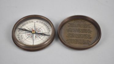 A Reproduction Brass Circular Pocket Compass, The Lid Having 100 Year Calendar, 1957-2065, As Made