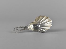 A Silver Caddy Spoon with Scrolled and Pierced Handle and Shell Bowl, Sheffield Hallmark, 9cm long