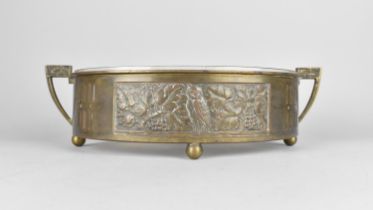 A Pressed Metal WMF Style Oval Two Handled Bowl with Glass Liner, Decorated in Relief With Owl and