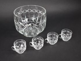 An Atlantis Waterford Punch Bowl and Four Glasses