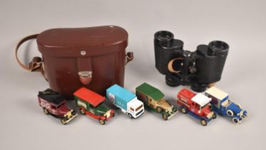 A Pair of Carl Zeiss Jena Deltrintem 8x30 Binoculars together with Diecast Model Vans
