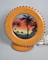 A 1950s Back Lit Table Lamp decorated with Arabic Scene and Monkey Climbing Palm Tree, 25cms High