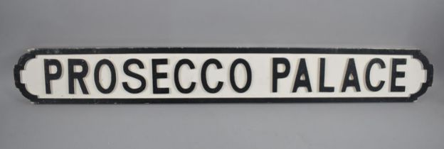 A Modern Wooden Sign in the Form of a Victorian Road Sign, "Prosecco Palace", 105cms Long