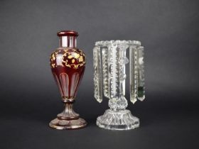A Bohemian Ruby Glass and Gilt Decorated Vase together with a Plain Glass Lustre, 21cms High