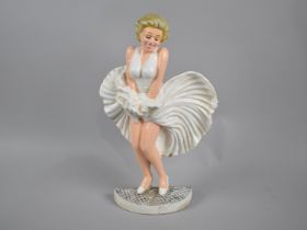 A Reproduction Cold Painted Cast Metal Door Stop in Form of Marilyn Monroe, 34cms High