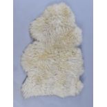 A Sheepskin Rug, Approx 100x67cms