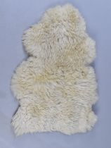 A Sheepskin Rug, Approx 100x67cms