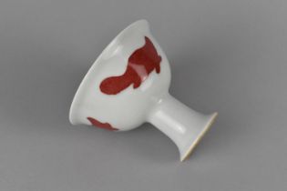 A Chinese Porcelain Stem Cup Decorated with Zoomorphic Motif in Red on White Ground, Six Character