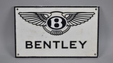A Reproduction Cold Painted Cast Metal Sign for Bentley, 30x18.5cms