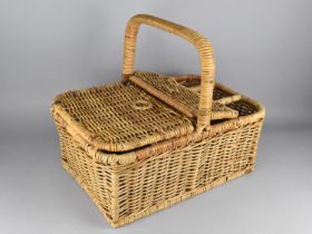 A Modern Wicker Picnic Basket with Hinged Lid, Removable Tray and Three Bottle Store