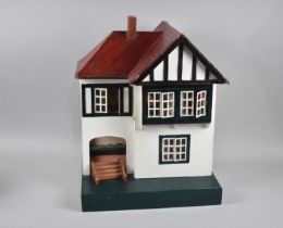 A Vintage Dolls House, Wooden Plinth base 35cms Wide