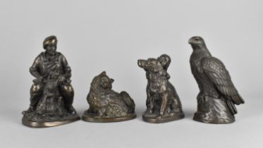 A Collection of Four Bronze Effect Resin Ornaments Depicting Animals, Eagle and Figure, Tallest
