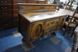 An Oak Galleried Sideboard with Two Centre Drawers Flanked by Cupboards, 151cm