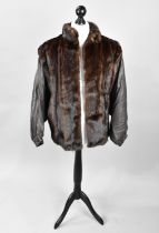 A Modern Leather and Fur Ladies Jacket