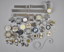 A Collection of Various Watch Parts and Straps