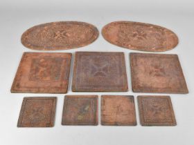 A Collection of Various Copper Coasters