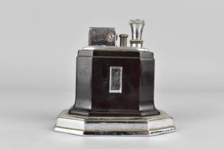 An Art Deco Ronson Touch Tip Table Lighter in Chrome and Bakelite