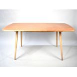 An Ercol Rectangular Dining Table, 150x74cms
