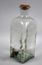 A Mid 20th Century Rectangular Glass Bottle with Brass Tap, 27.5cms HIgh