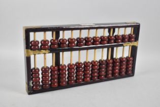 A Modern Chinese "Red Lion" Abacus, 36cms Wide