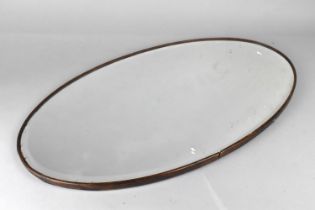 A Mid 20th Century Bevelled Edge Oval Wall Mirror, 66cms Wide