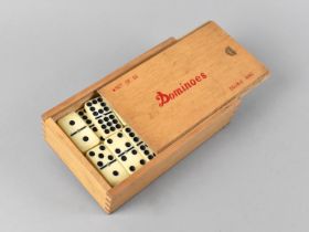 A Mid 20th Century Set of Double Nine Dominoes