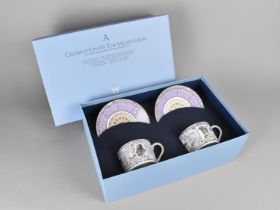 A Boxed Wedgwood Set of Two Cups and Saucers, A Celebration of the Millennium