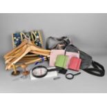 A Collection of Various Vintage Clothes Hangers, Magnifying Glass, Canvas Bag Etc