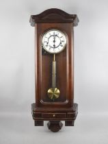 A Modern Westminster Chime Mahogany Cased Wall Clock, Base Drawer Containing Key