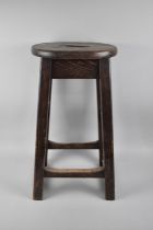 A Vintage Oval Topped Stool with Cut Out S Carrying Slot