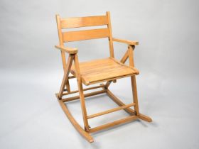 A Mid 20th Century Hinged Child's Rocking Chair