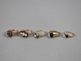 A Collection of Five 9ct Gold Jewelled Rings to include Garnet and Opal, Onyx, Mystic Topaz with