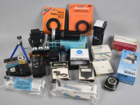 A Collection of Various Photographic Accessories to include Slide Duplicator, Lens Hoods, Light