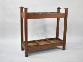 An Edwardian Oak Three Section Stick and Umbrella Stand with Metal Trays, 79cms by 30cms by 77cms