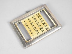 An Edwardian Silver Framed Desktop Calendar Front Mount Piece with Bakelite Calendar Front By Stokes