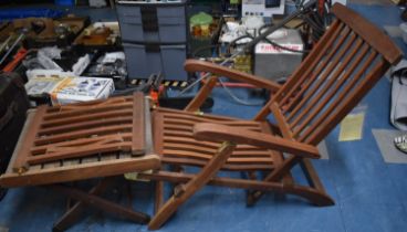 A Modern Steamer Chair and similar Table in Teak