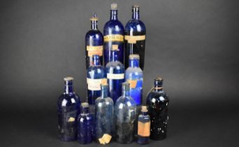 A Collection of Twelve Victorian and Edwardian Glass Chemist's or Apothecary Bottles, Tallest 25cm