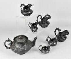 A Collection of Various Victorian Jackfield Jugs and a Teapot (Various Condition Issues)