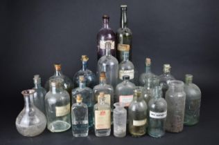 A Collection of Twenty-Two Various Chemist or Apothecary Glass Bottles, Some with Paper Labels,