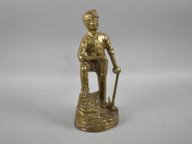 A Cast Brass Figure of a Miner with Axe and Safety Lamp, 28cms High