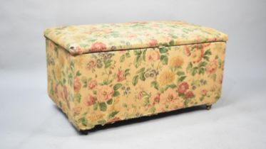 An Edwardian Fabric Covered Ottoman with Hinged Upholstered Lid, Containing Various Fabrics, 85cm