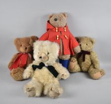 A Vintage Paddington Bear and Three Teddy Bears